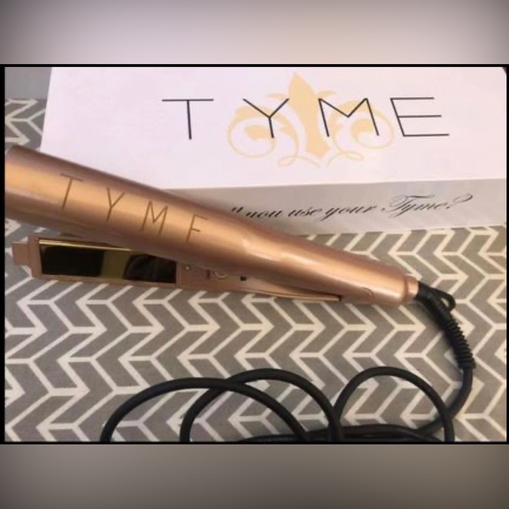 TYME Hair curler or straightener.